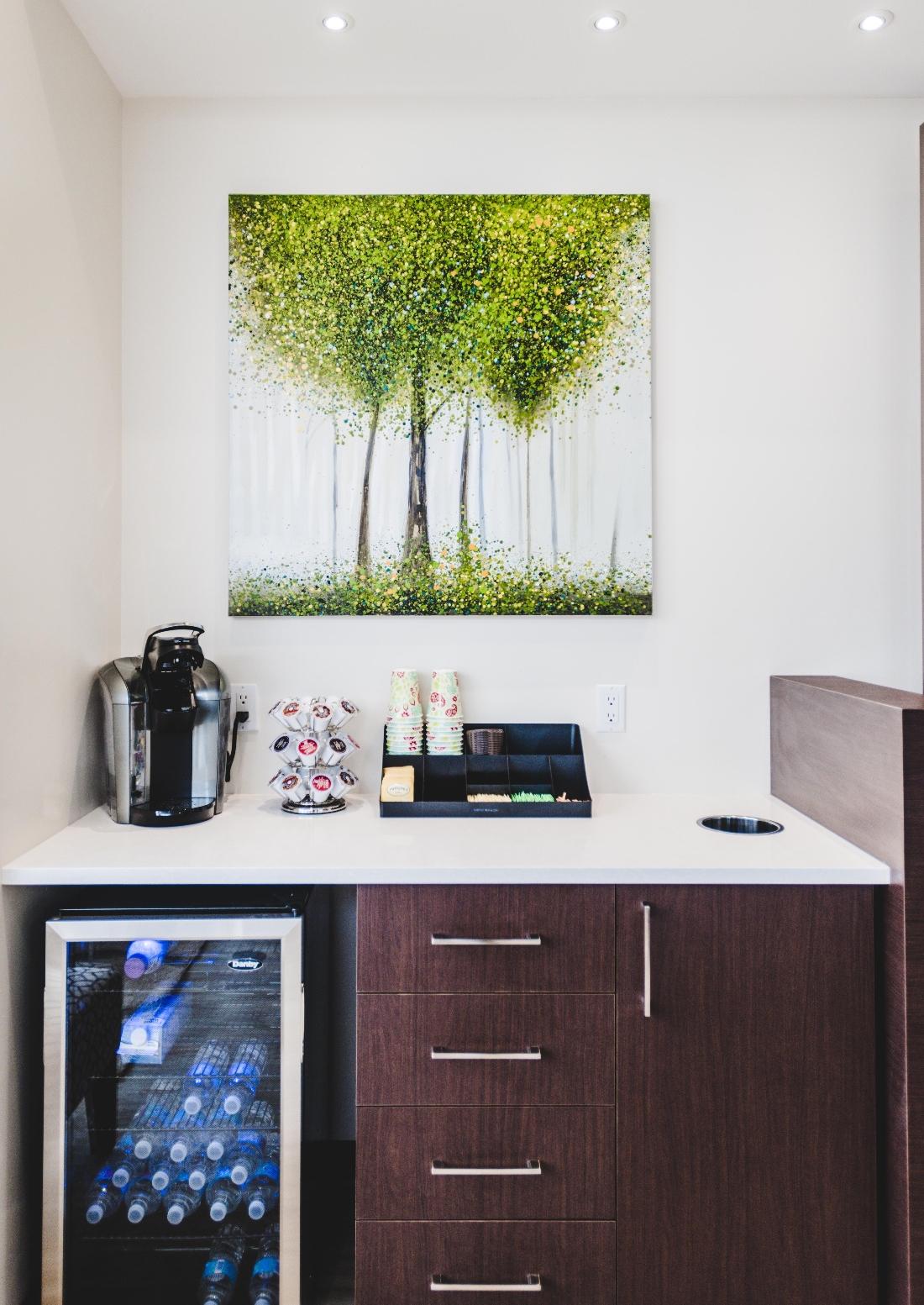 Water, Coffee and Tea for your Comfort Coffee maker and fridge with water bottles | Orchards Dental